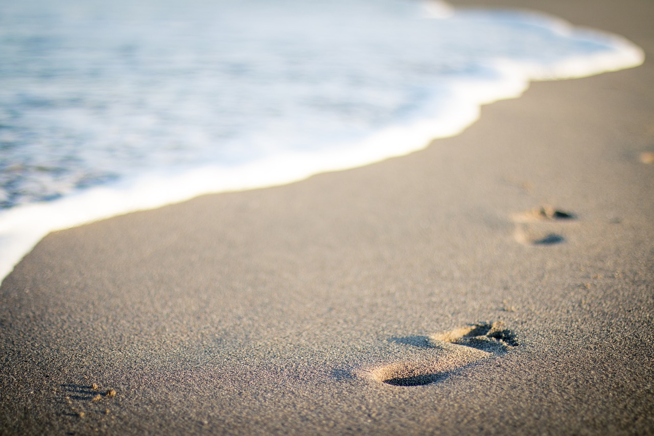 Steps On Beach Sand